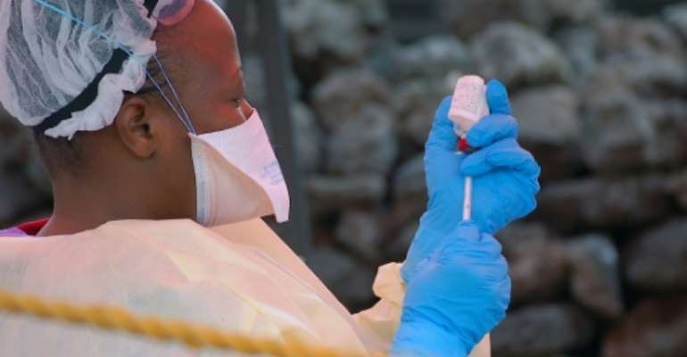 Vaccination is playing a key role in the fight against DR Congo's Ebola epidemic. Two tested but unlicensed vaccines are being given to frontline health workers and other people at risk. By Augustin WAMENYA (AFP/File)