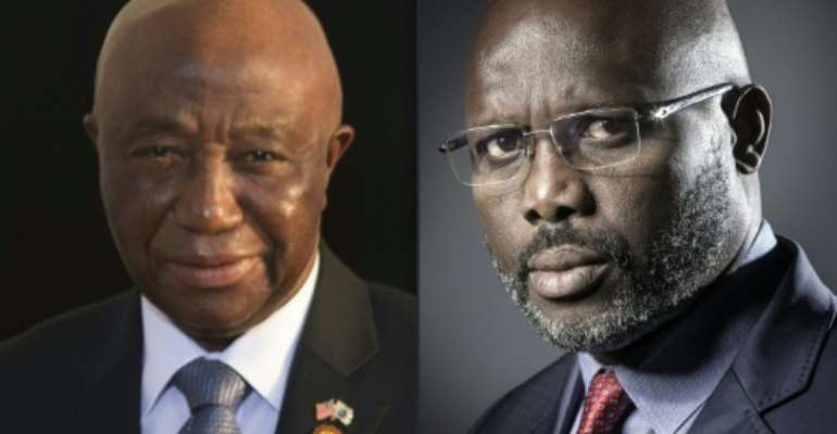 Vice President Joseph Boakai, left, will face off with former football star George Weah in Liberia's presidential runoff. But the vote -- scheduled for November 7 -- may be delayed because of a legal challenge. By JOEL SAGET, Brendan SMIALOWSKI (AFP/File)