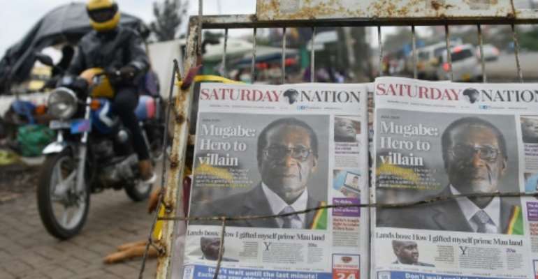 While Mugabe is hailed for having led Zimbabwe to independence, some people blame him for having wrecked the country's economy. By SIMON MAINA (AFP)