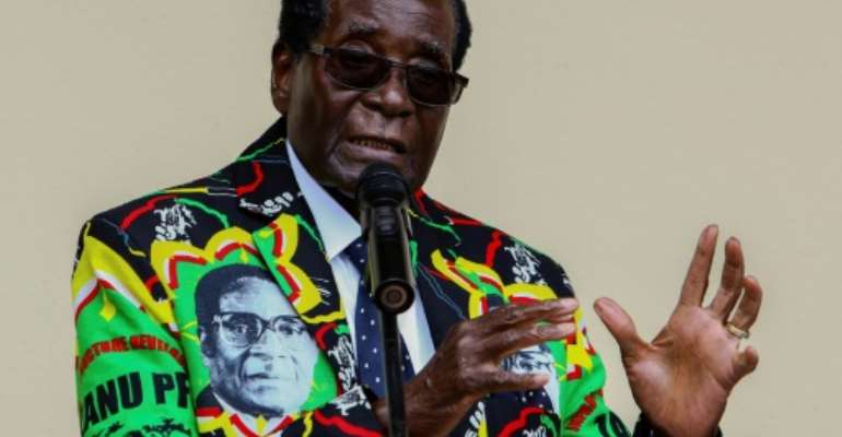 Zimbabwe President Robert Mugabe speaks at the party's annual conference on December 17, 2016 in Masvingo. By Jekesai NJIKIZANA (AFP/File)