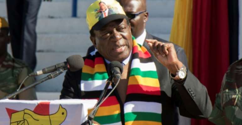 Zimbabwean President Emmerson Mnangagwa, pictured on July 21, 2018, has vowed to hold a peaceful and fair vote, but there is growing concern over alleged voter intimidation ahead of the eleciton. By Wilfred Kajese (AFP)