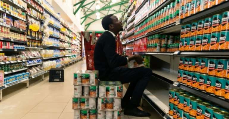 Zimbabwe's inflation rate hit 175 percent in June, bringing back memories of the hyperinflation that reached 500 billion percent in 2009. By Jekesai NJIKIZANA (AFP/File)