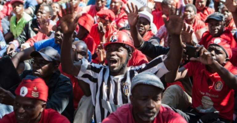 Zimbabwe's opposition party Movement for Democratic Change (MDC) supporters shout anti-government slogans during a demonstration in Gweru, on August 13, 2016. By Zinyange Auntony (AFP)