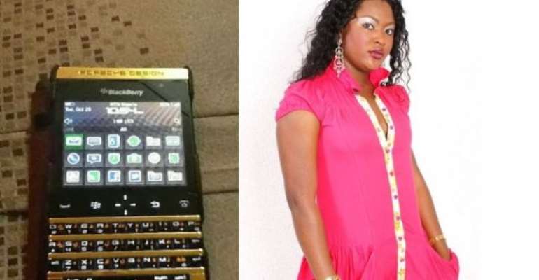 Actress Uche Elendu Rocks London With 24 Carat Gold Plated BB Porche With Daughter