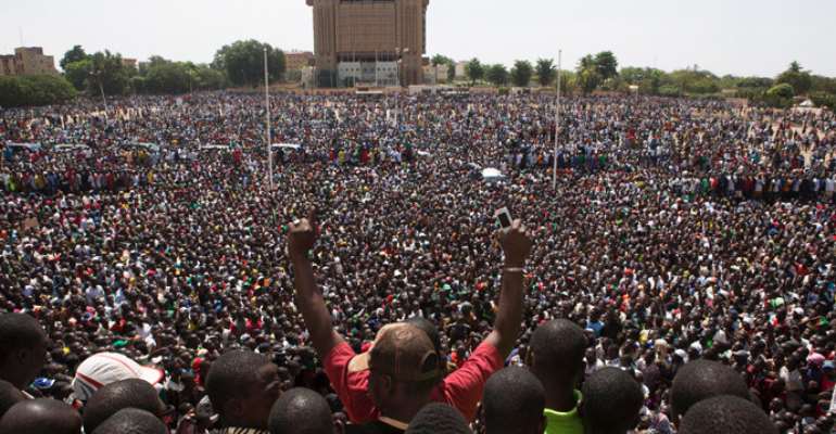 Burkinabe protesters demand Pres. Blaise Campoare's resignation Place de la Nation Ouagadougou Burkina Faso 103114 by Joe Penney Reuters