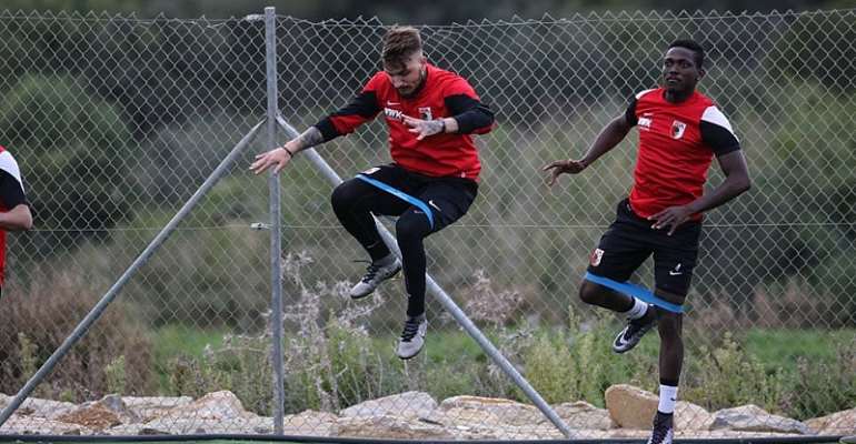 Daniel Opare, right, played for Augsburg in a friendly game on Tuesday