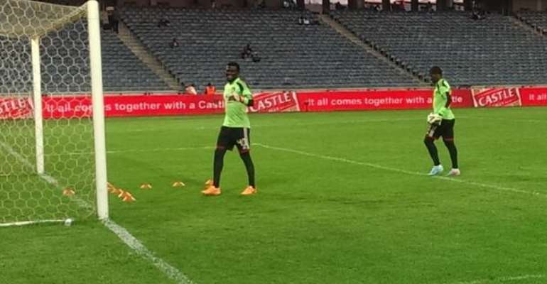 Dauda warming up with Meyiwa ahead of Tuesday's game
