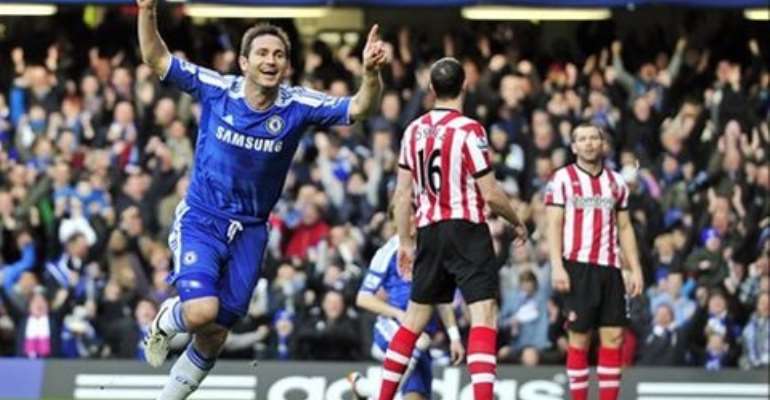 Lampard celebrates his first-half winner - his 11th goal this season