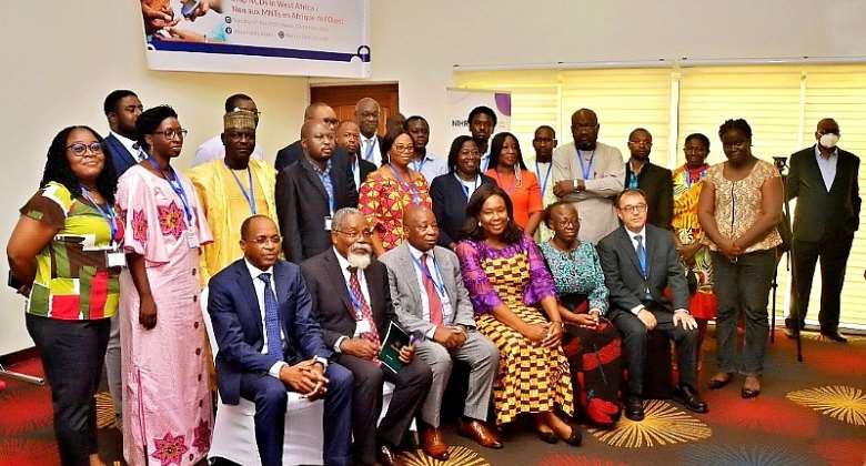 Ghana's Minister of Health Kweku Agyeman-Manu third from left in a photograph with officials of NIHR and NIHR STOP NCDs implementing partners after the launch