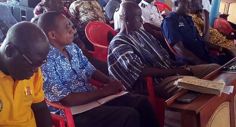 MCE for Berekum East, Mr. Kofi Adjei (in smock) with a cross-section of dignitaries at the Special Town Hall meeting