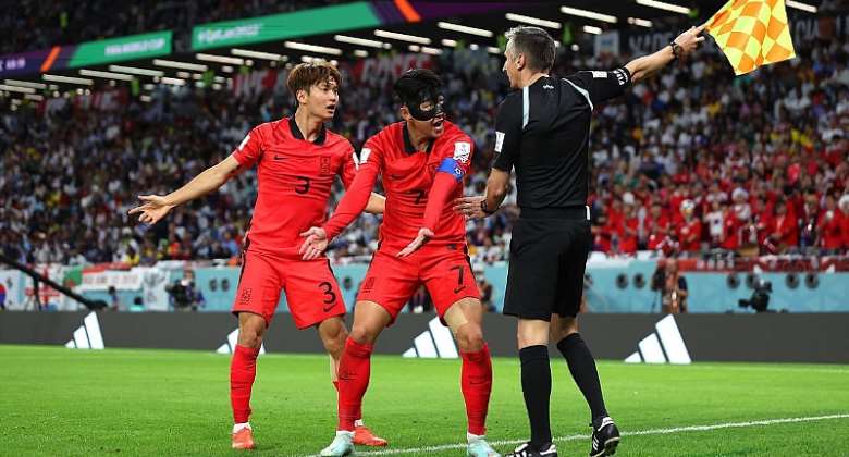 Heungmin Son C and Jinsu Kim of Korea Republic argue a call with match officials during the FIFA World Cup Qatar 2022 Group H match between Uruguay and Korea Republic at Education City StadiumImage credit: Getty Images