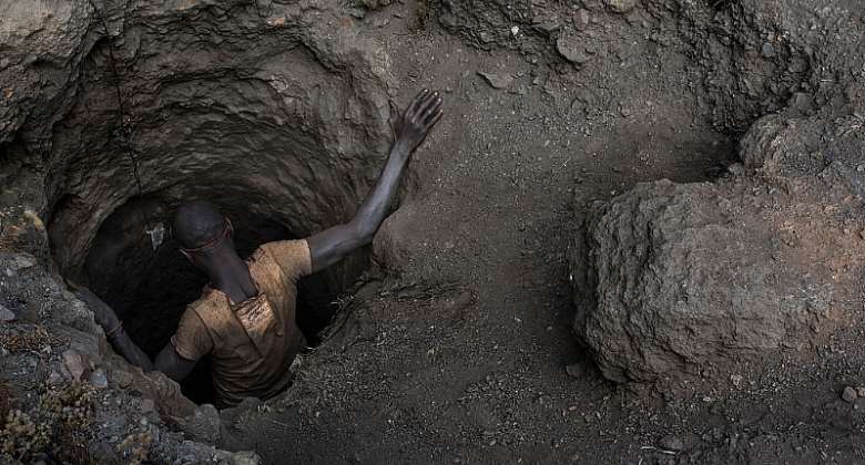 A &quot;creuseur,&quot; or digger, descends into a tunnel at the mine in Kawama, Democratic Republic of Congo. - Source: Michael Robinson Chavez/The Washington Post via Getty Images