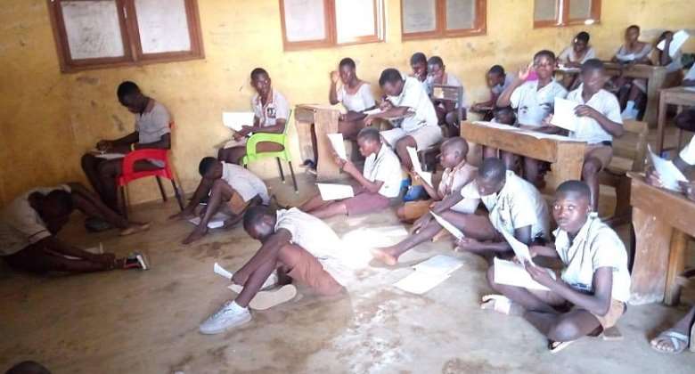 Gushegu Demonstration JSS pupils sit on bare floor for exams over lack of furniture