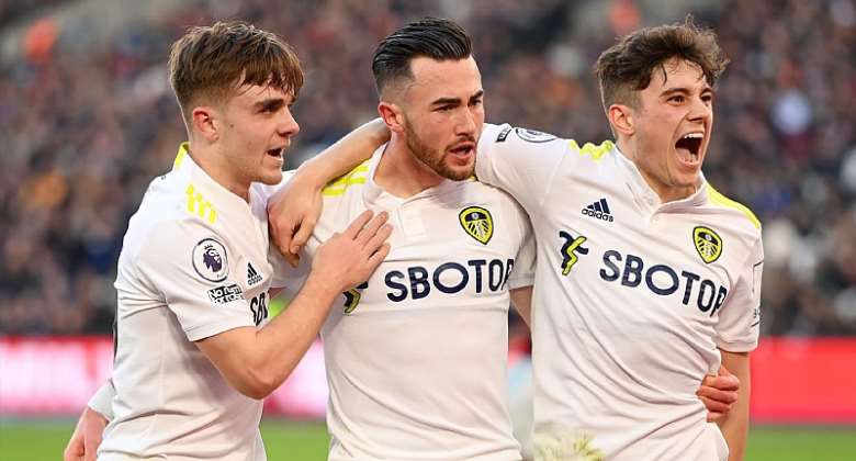 Jack Harrison celebrates with Lewis Bate and Daniel James of Leeds Unitedafter scoring their team's third goal during the Premier League match between West Ham United and Leeds United at London Stadium on January 16, 2022 in London, England.Image credit: Getty Images