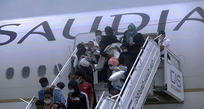 Ethiopian migrants stranded in Saudi Arabia arrive at Bole International Airport in Addis Ababa, Ethiopia in 2021.  - Source: Minasse Wondimu HailuAnadolu Agency via Getty Images