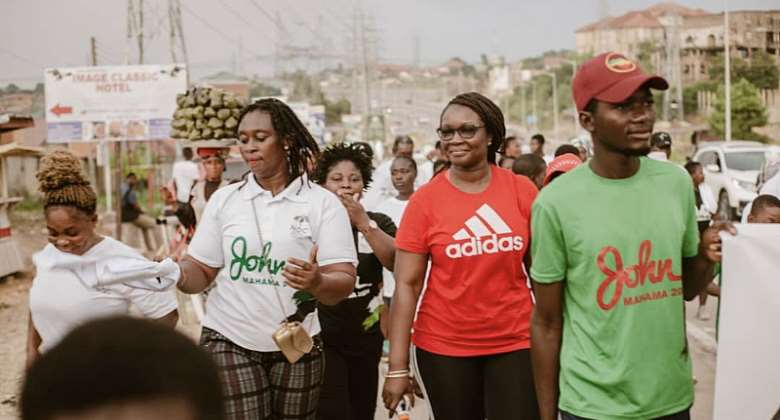Members of the NDC during a health walk at Pokuase, Accra