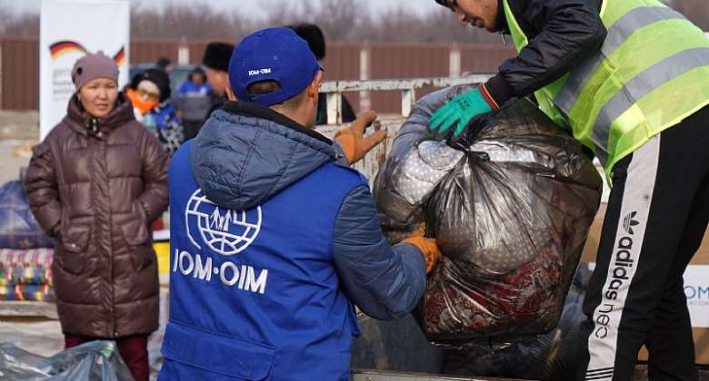 IOM staff loading winter assistance in the Kyrgyz capital Bishkek for transport to remote border communities where thousands of people are still displaced by last Septembers armed clashes. Photo: IOMKanat Sharipbekov and Adilet Abdyrasul uulu.