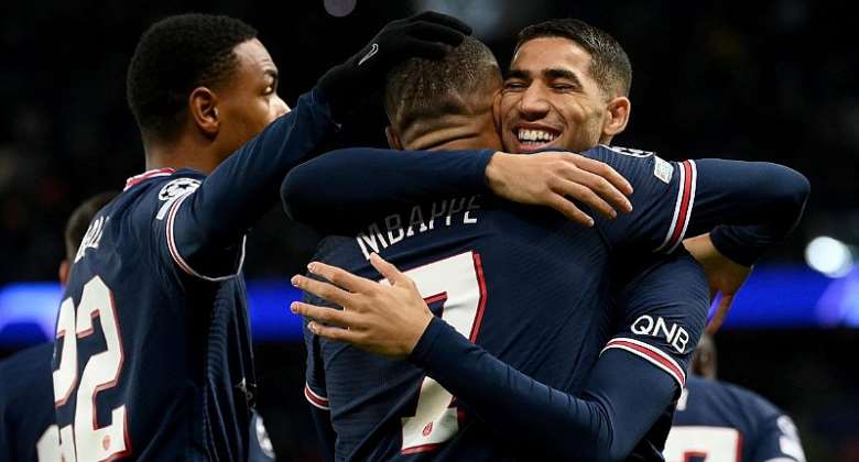 Paris Saint-Germain's French forward Kylian Mbappe (C) is congratulated by team mates after scoring a goal during the UEFA Champions League first round day 6 Group A football match between Paris Saint-Germain (PSG) and Club Brugge, at the Parc des Princes

Image credit: Getty Images