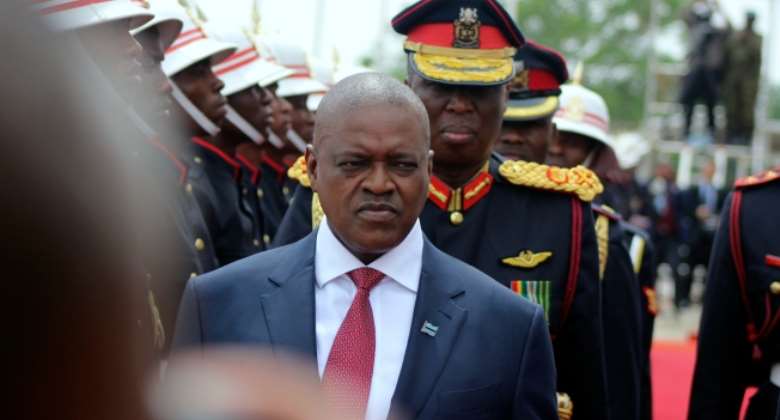 Botswana President Mokgweetsi Masisi inspects a guard of honor at a ceremony in Gaborone, Botswana, on November 1, 2019. Masisi's government has proposed a bill that could allow warrantless surveillance of journalists. APSello Most