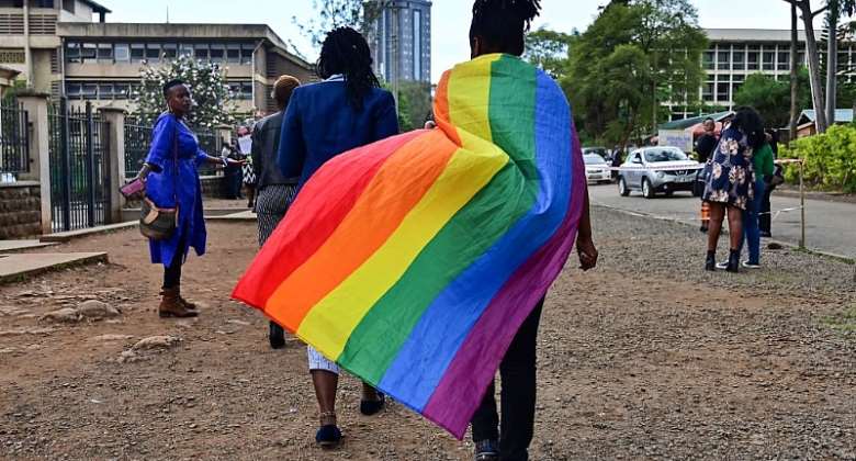 An activist leaves Kenyaamp;39;s high court after a 2019 ruling refused to scrap laws criminalising homosexuality. - Source: TONY KARUMBAAFP via Getty Images