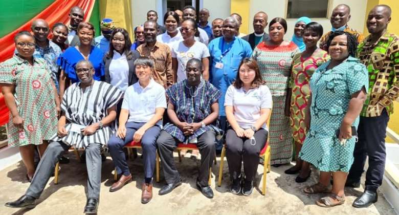Officials of KOFIH and some KATH staff in a photograph in front of the new Laparoscopic Surgical Training Centre