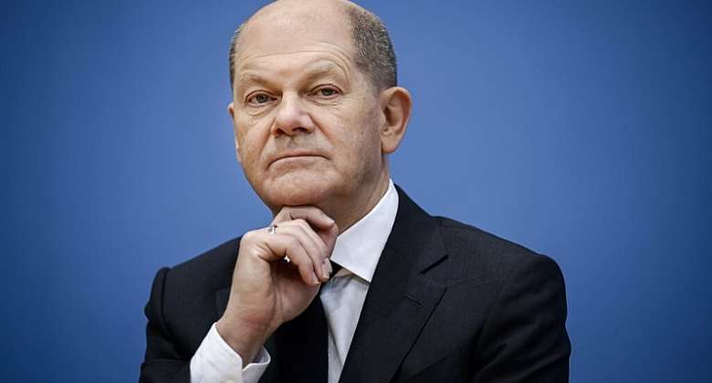 Olaf Scholz at a press conference in Berlin