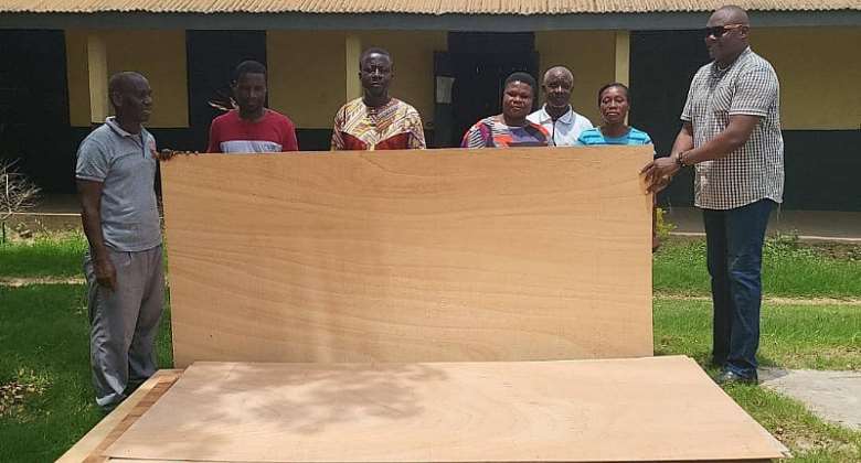 Cape Coast North MP supports Pedu MA Basic 'A' school with plywood to refurbish teachers staff room
