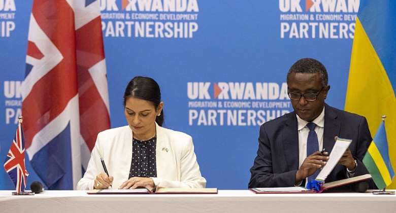 From file: UK Home Secretary Priti Patel signs the agreement with the Rwanda Foreign Affiars Minister Vincent Biruta April 14, 2022  Photo: Olivier Muhizi  AP  Picture alliance