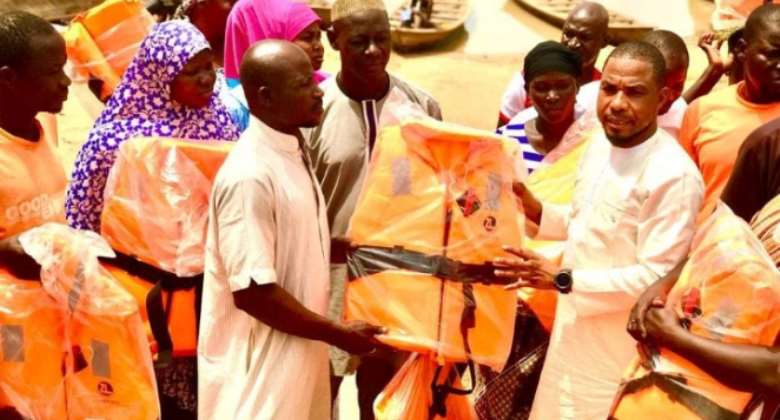 North Gonja DCE donates safety jackets to boat operators in Daboya