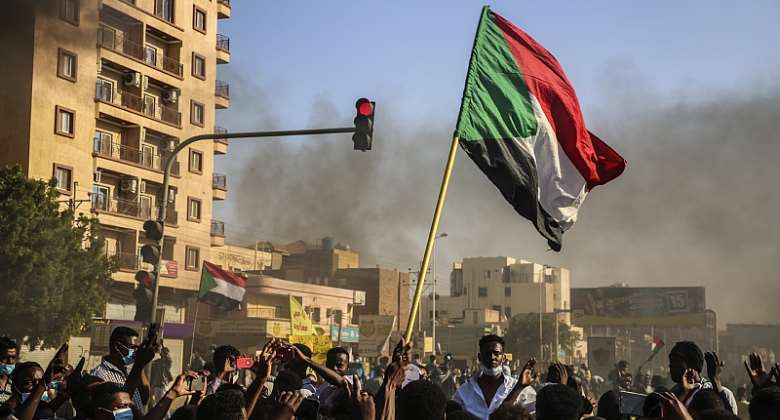 Sudanese people march in Khartoum during one of many protests against the 2020 coup. More than 100 have been killed.  - Source: EFE-EPASStringer