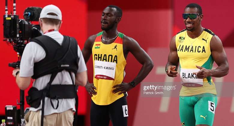 TOKYO, JAPAN - JULY 31: Benjamin Azamati-Kwaku of Team Ghana and Yohan Blake of Team Jamaica react prior to in the Men's 100m Round 1 heats on day eight of the Tokyo 2020 Olympic Games at Olympic Stadium on July 31, 2021 in Tokyo, Japan. Photo by Patrick SmithGetty Images