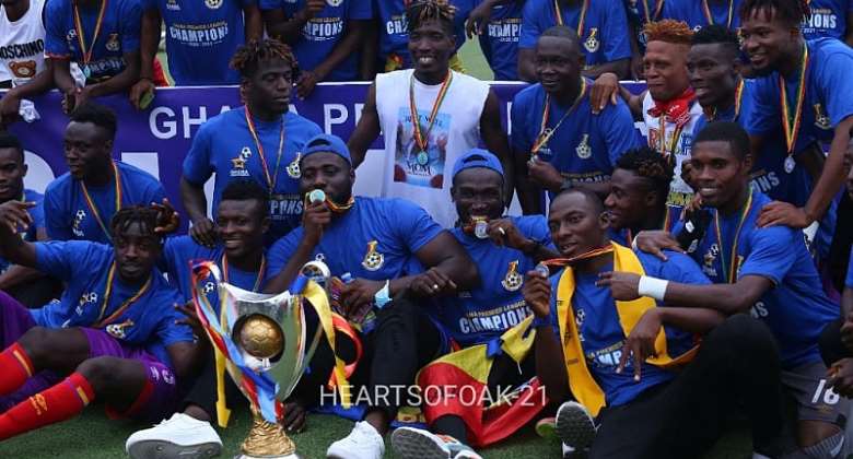 Players of Accra Hearts of Oak displaying the league trophy after their coronation