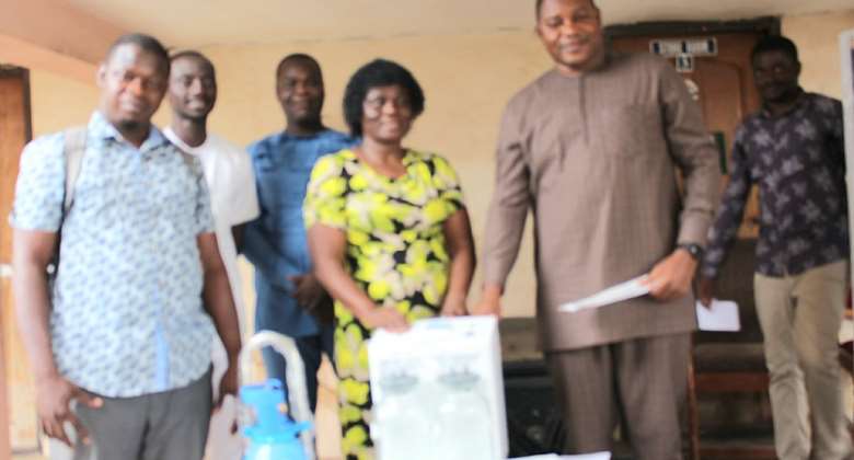 Obuasi MCE presents medical equipment to the Sanso Health Centre
