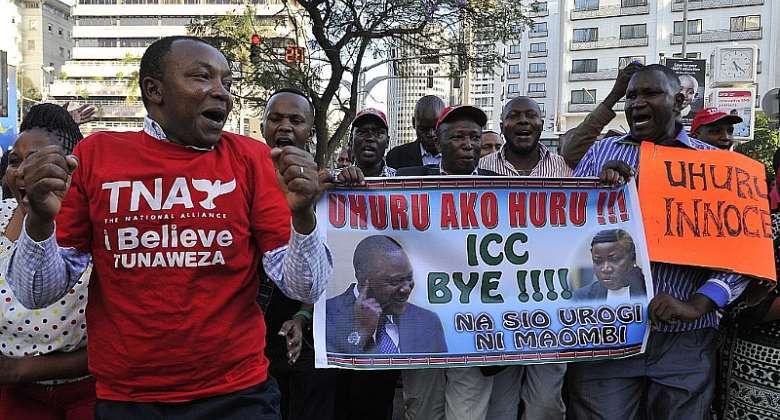 Supporters of Kenyaamp;39;s President Uhuru Kenyatta celebrate after the ICC dropped charges against him in 2014.   - Source: Simon MainaAFP via Getty Images