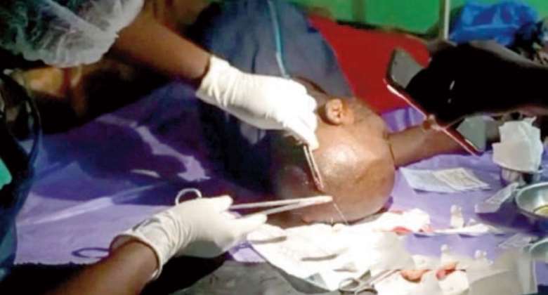 The victim receiving treatment at the hospital