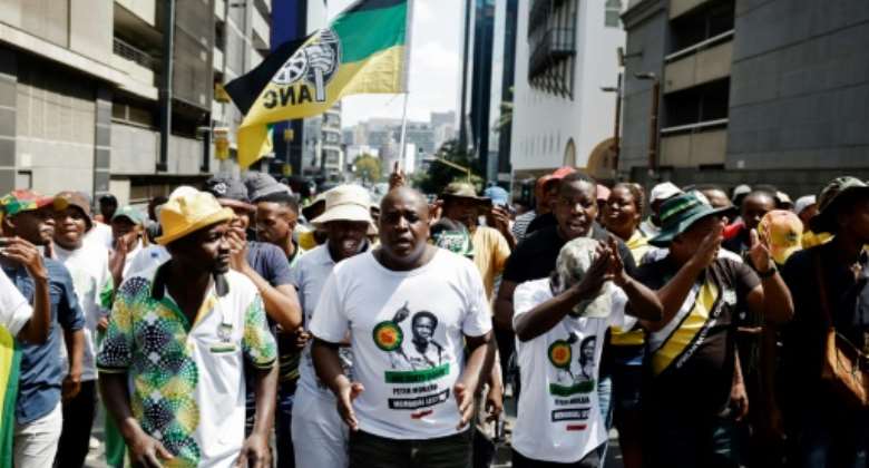 A few hundred ANC supporters gathered at the party's headquarters for a counter-demonstration.  By Marco LONGARI AFP