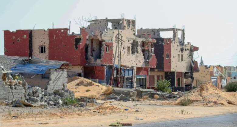 A residential building damaged during months of fighting between the UN recognised government and forces of Khalifa Haftar, in a southern neighbourhood of the capital Tripoli on July 9, 2020.  By Mahmud TURKIA (AFP/File)