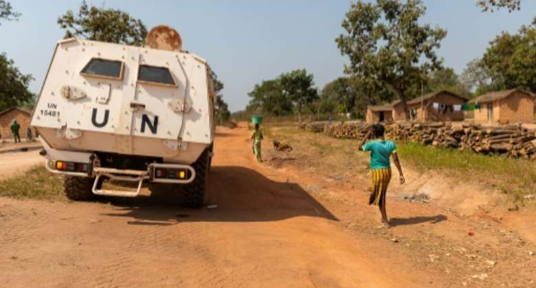 A UN armoured personnel carrier patrols on a supposedly safe road, avoiding potentially mined roads which have posed a growing threat to locals in recent months.  By Barbara DEBOUT (AFP)