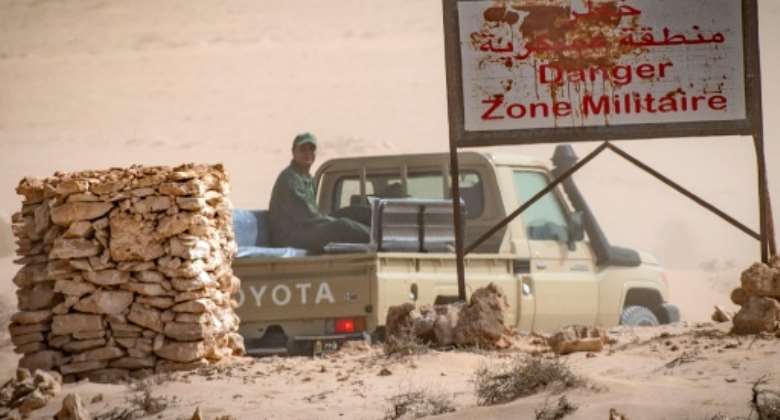 A vehicle of the royal Moroccan armed forces on the Moroccan side of border crossing point with Mauritania in Guerguerat located in the Western Sahara, on November 25, 2020.  By Fadel SENNA AFPFile
