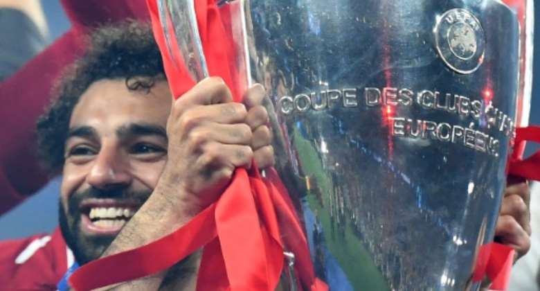 Africa Cup of Nations favourites Egypt will rely heavily on Mohamed Salah, seen here with the UEFA Champions League trophy after Liverpool beat Tottenham in the final this month.  By GABRIEL BOUYS AFPFile