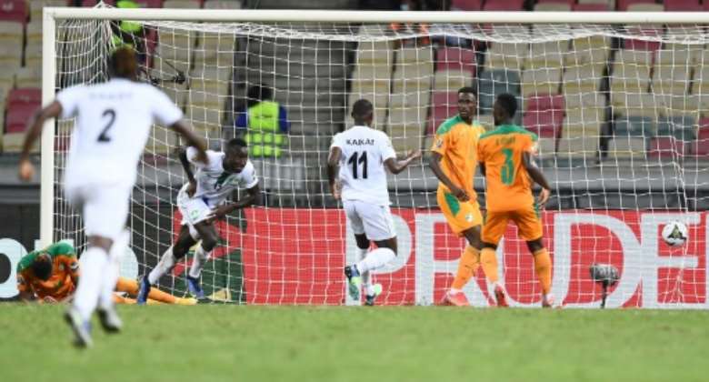 Alhaji Kamara 3rd L scored a stoppage-time equaliser for Sierra Leone against Ivory Coast after a goalkeeping error.  By CHARLY TRIBALLEAU AFP