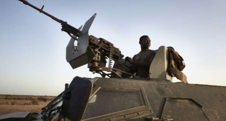 Burkina Faso troops are among those struggling to combat jihadists in the three-border region.  By MICHELE CATTANI AFP