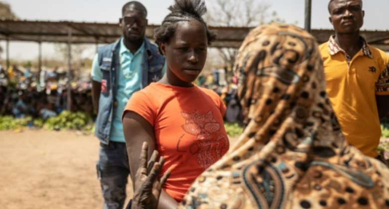 Burkina phenomenon: Amsetou Nikiema, centre, also called Adja.  By OLYMPIA DE MAISMONT AFP