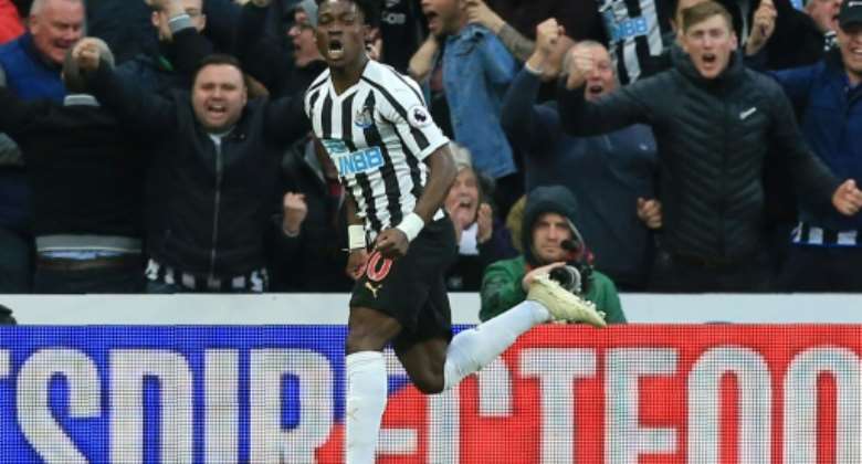Christian Atsu celebrates scoring for Newcastle in 2019.  By Lindsey PARNABY AFPFile