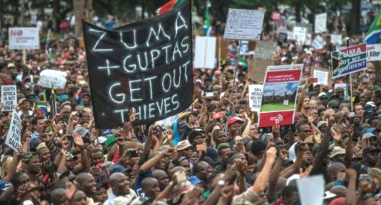 Corruption scandals linked to the Gupta brothers sparked mass protests, culminating in President Jacob Zuma's ouster in 2018.  By MUJAHID SAFODIEN AFP