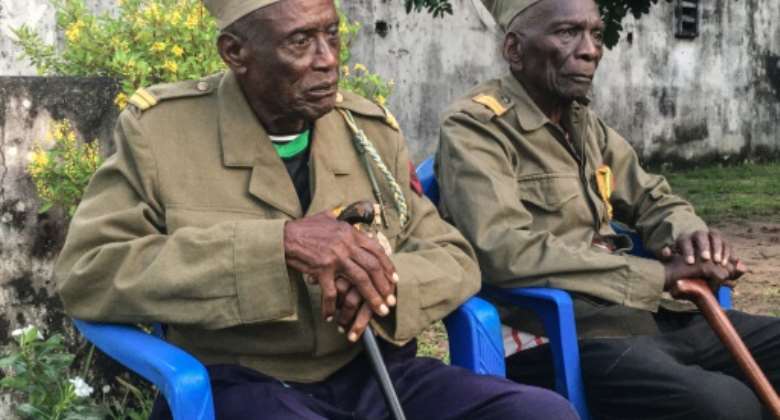 Daniel Miuki R and Albert Kunyuku Ngoma L are the last survivors of the Public Force, the Belgian colonial army.  By Manu Kalombo AFP