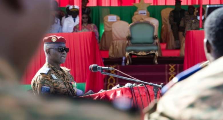 Defence Minister Colonel Kassoum Coulibaly urges civilians to join the VDP in a speech to mark armed forces' day.  By Martin Demay AFP
