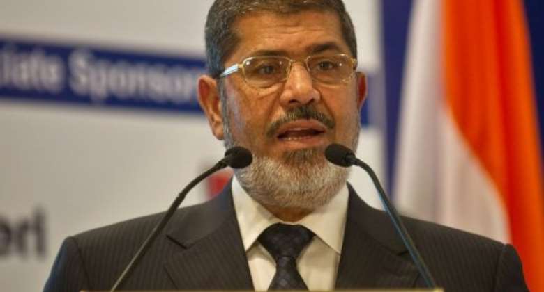 Egyptian President Mohamed Morsi addresses a gathering during India-Egypt Economic Forum in New Delhi on March 20, 2013.  By Manan Vatsyayana AFP