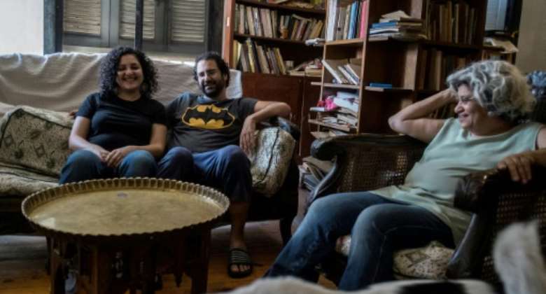 Egyptian activist and blogger Alaa Abdel Fattah, seen here with family in 2019, has spent the better part of a decade behind bars.  By Khaled DESOUKI AFPFile