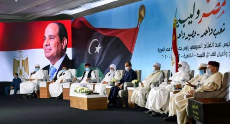 Egypt's President Abdel Fattah al-Sisi C met in mid-July with Libyan tribal leaders in the capital Cairo.  By - Egyptian PresidencyAFPFile